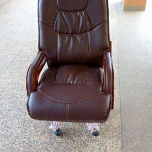 cream leather office chair with armrests