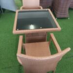 family outdoor dining set with woven chairs