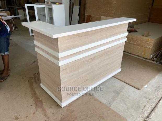 modern-wooden-front-desk-for-offices Designer Reception Desk for Premium Office Interiors Uganda - Image 1