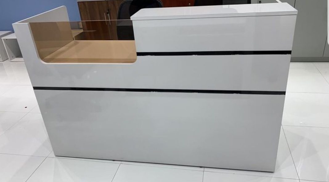 premium-office-counter-with-storage Compact Wooden Reception Desk for Small Offices Uganda - Image 1