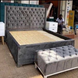 tufted bed with workspace