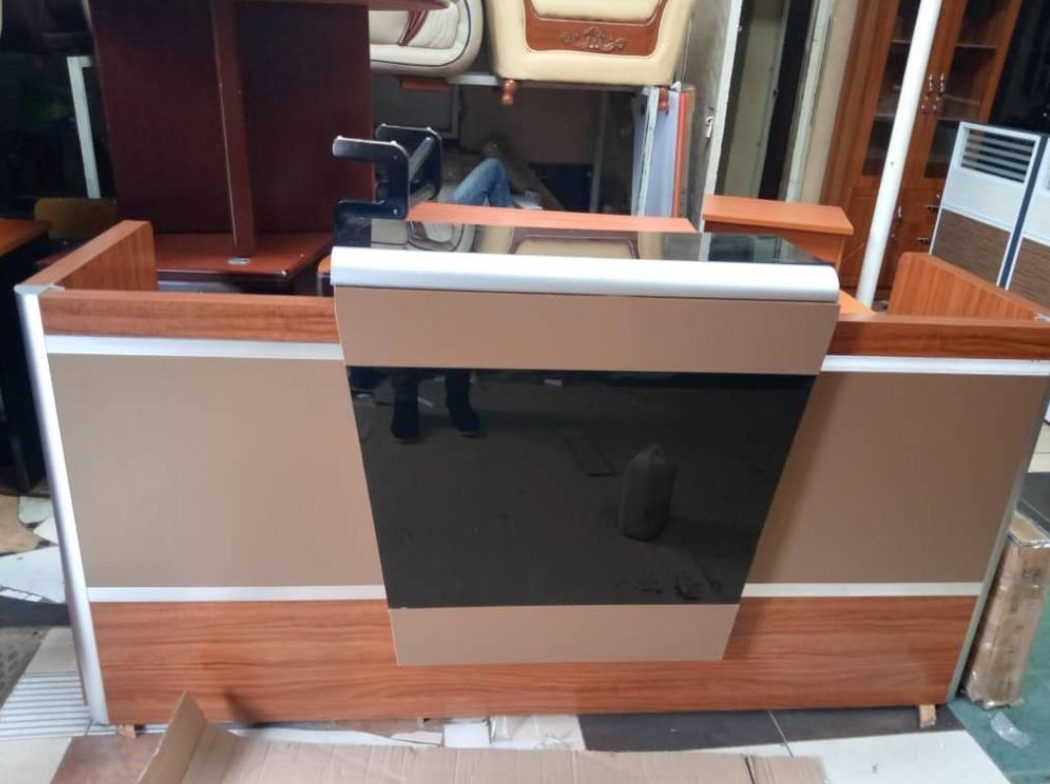 wooden-office-counter-with-storage Modern Reception Desk Uganda 1.4m Office Furniture Kampala for Corporate Office Reception Areas - Image 1