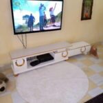 Contemporary TV Unit with Cabinets and Glass Top Kampala