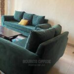 cozy beige sofa wood frame