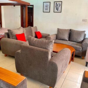 spacious beige sofa supportive back