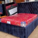 beige study bed with drawers