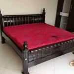 black upholstered workstation bed