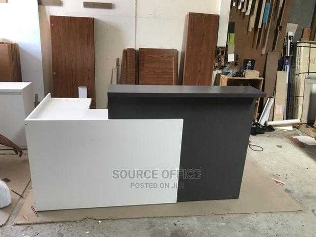 compact-commercial-reception-desk Efficient Office Front Desk with Multi-Drawer Storage System - Image 1