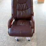 cream leather office chair with armrests