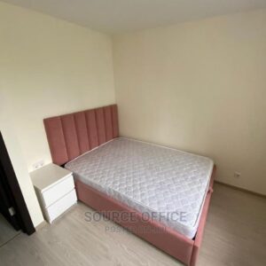 cream upholstered study bed