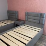 navy blue upholstered bed