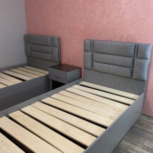 navy blue upholstered bed