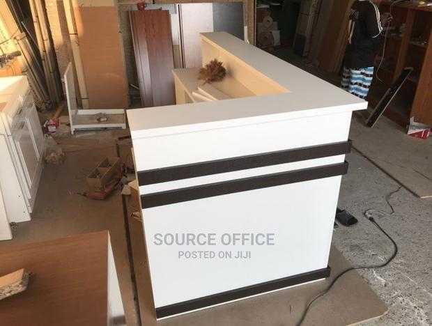 reception-table-with-spacious-storage High Strength Reception Counter Desk for Commercial Use Uganda - Image 1