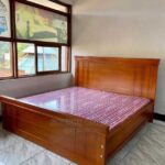 Elegant Solid Pine Bed Frame with Standard Height Design