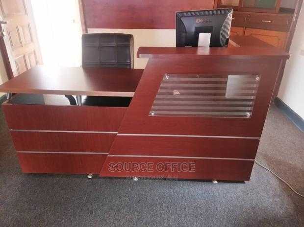 wooden-commercial-reception-desk 1.4m Compact Reception Desk for Urban Office Setups Kampala Uganda - Image 1